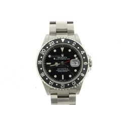 WATCH: [1] Men's St. Steel Rolex O.P. GMT Master II date wristwatch; black dial; bi-directional beze
