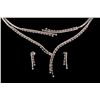 Image 1 : SUITE:  [1] 18KWG suite with matching necklace, bracelet and earrings set with 337 round diamonds, a