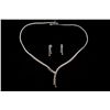 Image 2 : SUITE:  [1] 18KWG suite with matching necklace, bracelet and earrings set with 337 round diamonds, a