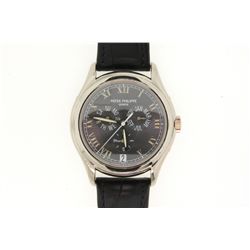 WATCH:  [1]  18KWG Gents. Patek Philippe Annual Calendar automatic watch with a grey dial, date, day