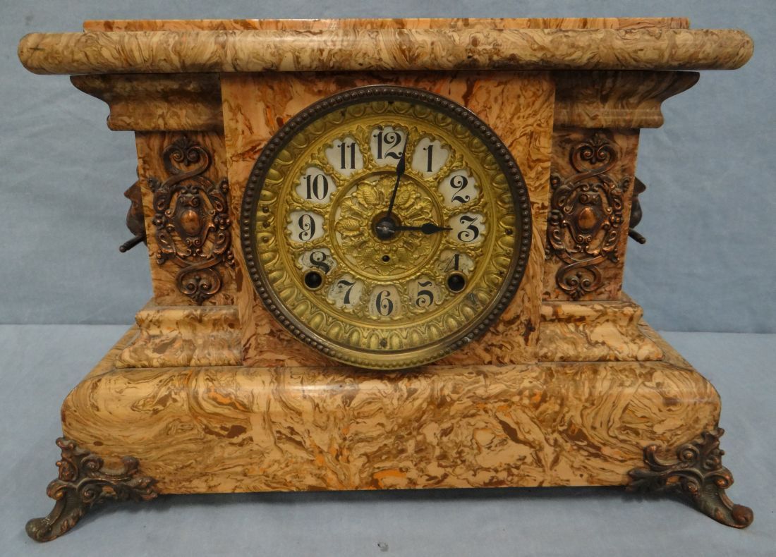 Seth Thomas mantle clock, marble style finish, copper lions feet, gold face