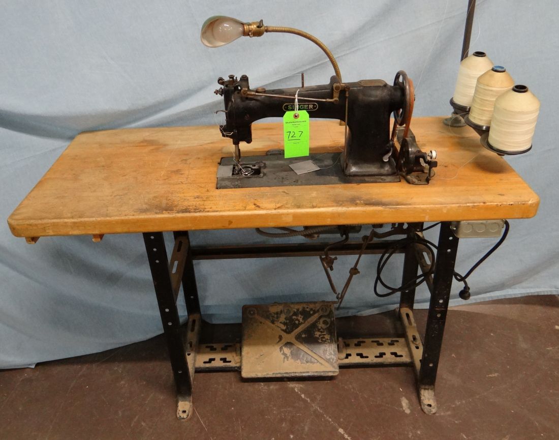 Singer leather sewing machine, elec., mounted on stand, speed tredle