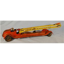 Kingsbury Toys fire truck, with ladder-climbing fireman, very old
