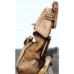 Montana Bear on Snowmobile Chainsaw Carving This l