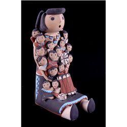Jemez Pueblo Storyteller by G. Gachupin This is an