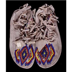 Plateau Indian Beaded Moccasins The lot features a