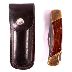 Schrade Knife and Scabbard This lot features a Sch