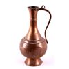 Image 1 : Antique Copper Pitcher This lot features an antiqu
