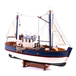 Wooden Fishing Boat Model This lot features a wood