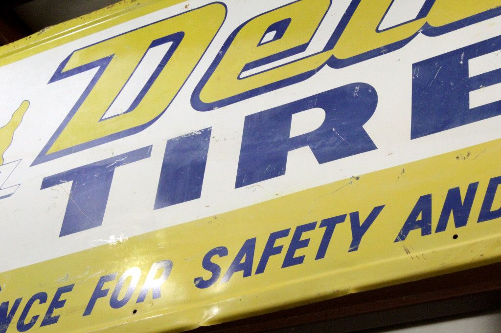 Vintage Delta Tires Metal Advertising Sign