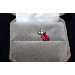 10 KT GOLD RUBY (1.45CT) AND DIAMOND PENDANT