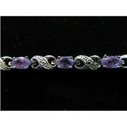 Ladies Amethyst & Diamond tennis bracelet