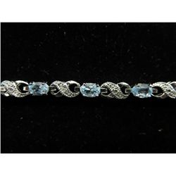 Ladies Blue Topaz & Diamond tennis bracelet