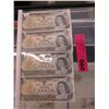 Image 1 : Four old Canada $1 bills
