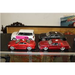 Four scale model cars