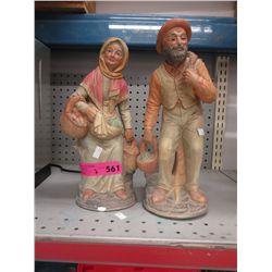 Ceramic statues of an old man & woman
