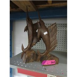Hand carved swordfish statues