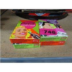 Four pkgs of Coca-Cola playing cards