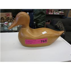Carved wood duck statue