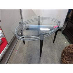 Oval glass top coffee table