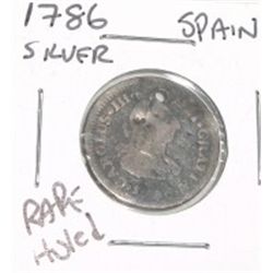 1786 SPAIN SILVER *RARE* COIN-HOLED!! COIN CAME OUT OF SAFE!!