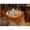 Image 2 : ROUND OAK TABLE WITH LEAF AND 4 CHAIRS