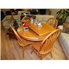 Image 1 : ROUND OAK TABLE WITH LEAF AND 4 CHAIRS - TALBE AS-IS