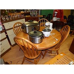 ROUND OAK TABLE WITH LEAF AND 4 CHAIRS