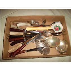 Assortment of cutlery; steakknives and serving spoons etc.