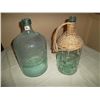 Image 1 : Green bottle with wicker woven on top; 1 matching bottle