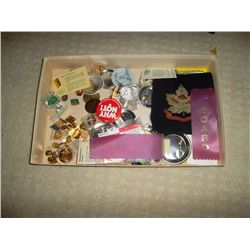 Collection of buttons and pins