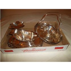 Silver gravy boat and candy dishes (3)
