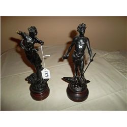 Black (resin ?) figurines mounted on wood 2