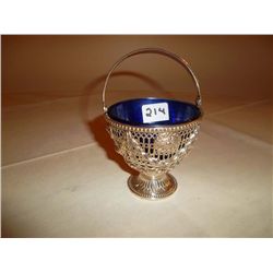 Pierced swing handled sugar basket on round pedestal foot made in Sheffield in 1777 by Tudor and Lea