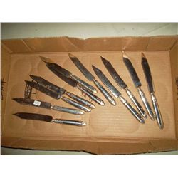 Set of silver triple plated knives