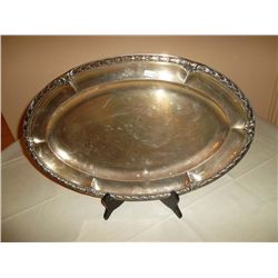 Large silver serving platter and stand
