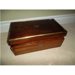 Rosewood writing slope 19th century (lap desk) with brass edges; leather writing surface; ink well