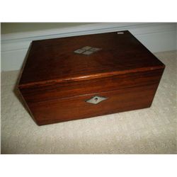 Wooden box with mother of pearl inlay on top