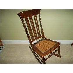 Oak rocking chair with cane or reed seat