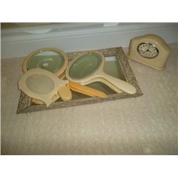 Bakelite dressing table accessories.  Tray; mirrors; clock
