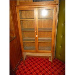 Oak glass front china cupboard
