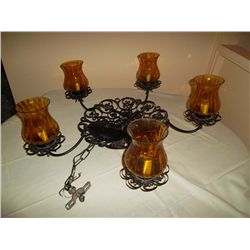 Wrought iron chandelier with amber glass