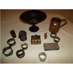 Silver box (1893) ; silver napkin rings; copper mug; wooden covered bottle