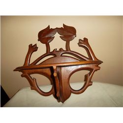 Small wood shelf (cut out leaves in back)