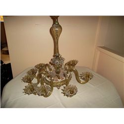 Green intricate beautiful glass chandelier (candles).