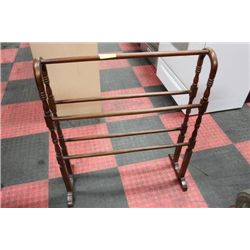 HAND CARVED QUILT RACK