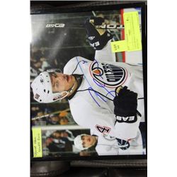 TAYLOR HALL AUTOGRAPHED 8 X 10 WITH COA