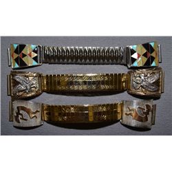 THREE PAIR OF WATCH BANDS