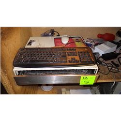 pos terminal with key board, mouse, lg monitor, printer, and computer.