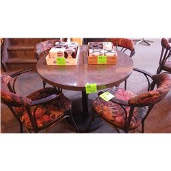 1 round centered pedestal table laminate with granite look finish